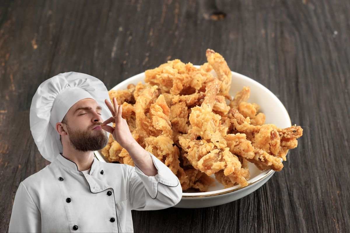 chef e piatto di funghi fritti