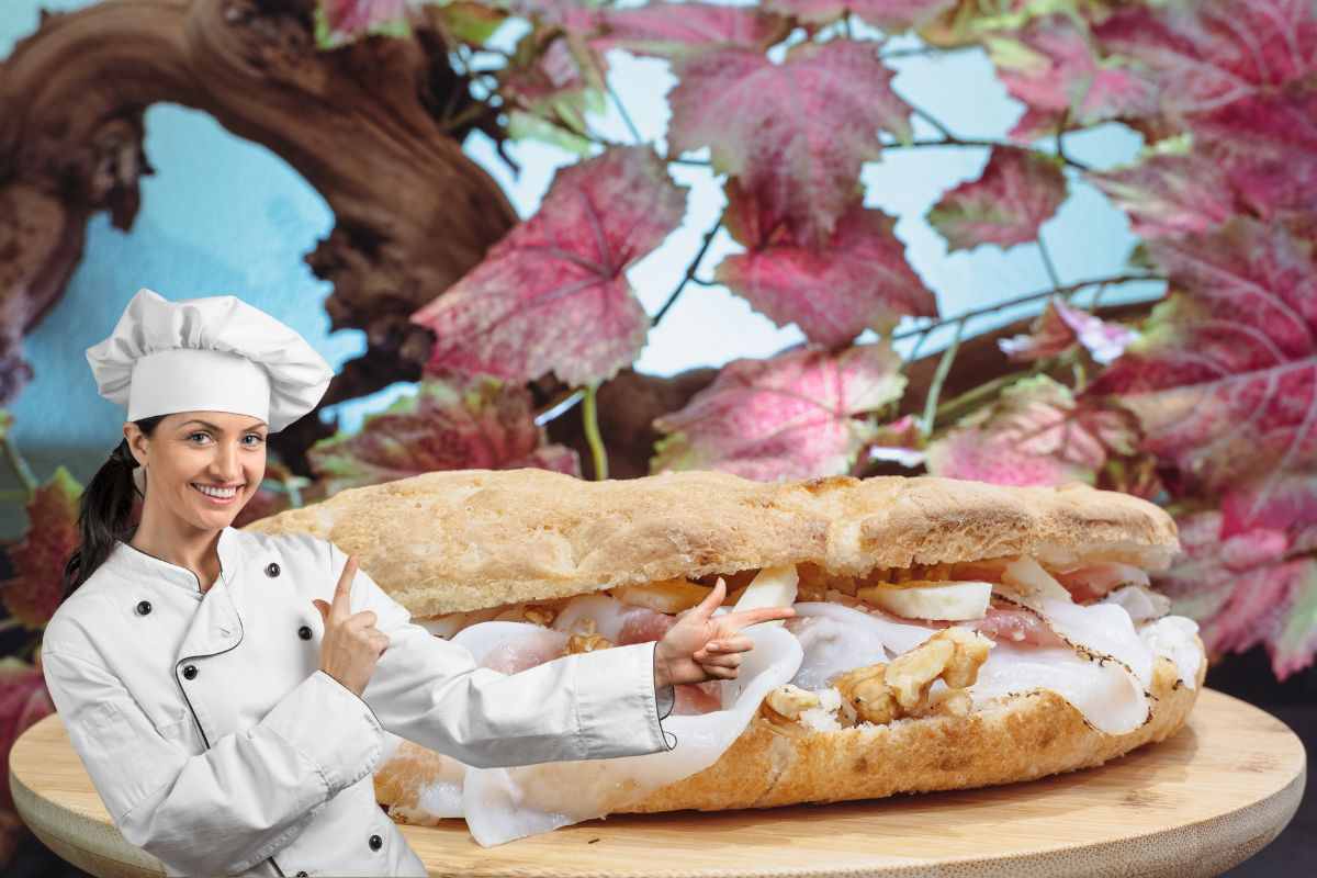 chef donna che indica un saltimbocca di pizza farcito